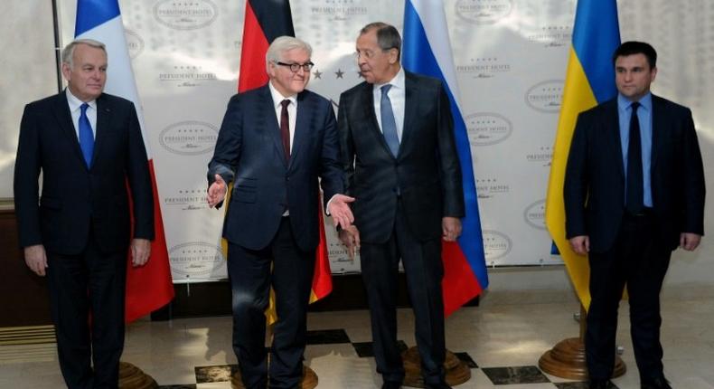 L-R: Foreign Ministers Jean-Marc Ayrault of France, Frank-Walter Steinmeier of Germany, Sergei Lavrov of Russia and Pavlo Klimkin of Ukraine pose prior to their talks on the Ukraine conflict in Minsk on November 29, 2016