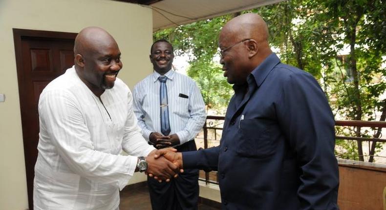 George Andah shaking hands with Nana Addo