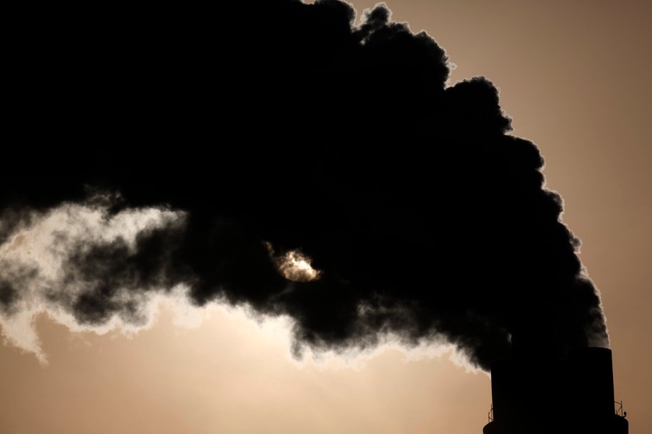 Smoke rises from the chimneys of a power plant in Shanghai, December 5, 2009.