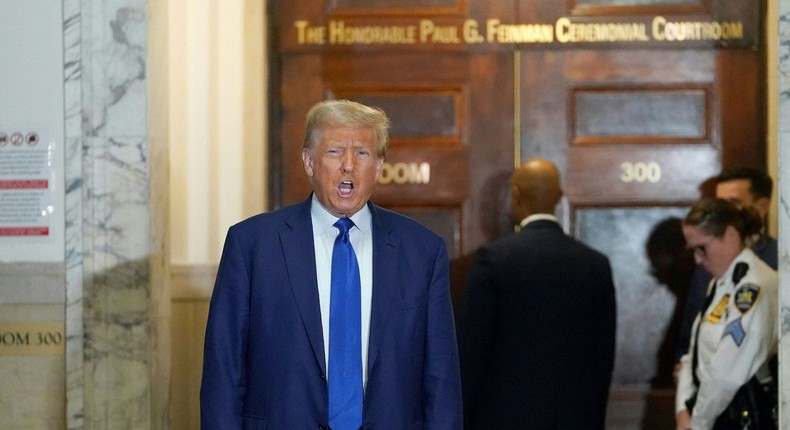 Former President Donald Trump speaks to reporters outside the New York State Supreme Court.Timothy A. Clary/AFP via Getty Images