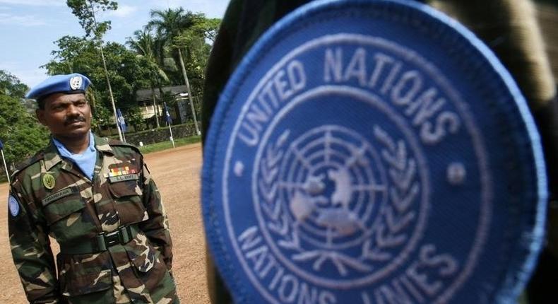 Sri Lankan Army soldiers march during a passing out ceremony before departing for Haiti as U.N. peacekeepers, at Panagoda army base, about 45 km (28 miles) from Colombo, December 23, 2009. REUTERS/Stringer