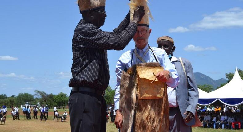 Alphonse Kamwara crowns James Wilber as Tharaka elder photo Alex Njeru NMG