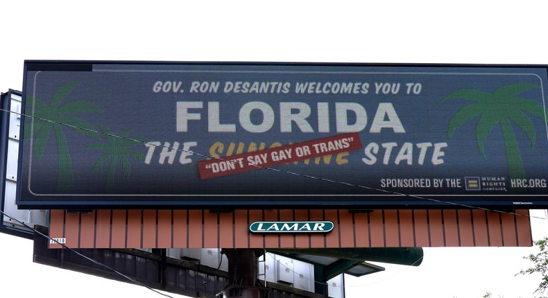 A new billboard welcoming visitors to Florida: The Sunshine 'Don't Say Gay or Trans' State' is seen on April 21, 2022, in Winter Park, Florida.John Raoux/AP