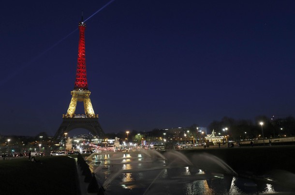 The Eiffel Tower is seen with the black, yellow and red colours of the Belgian flag in tribute to th