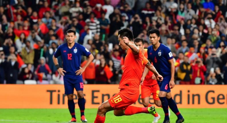 Gao Lin secured a quarter-final spot for China in the Asian Cup with a second-half penalty against Thailand