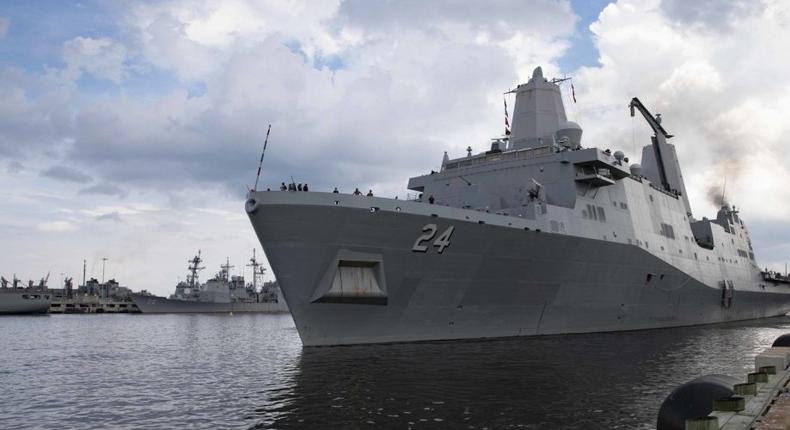 The San Antonio-class amphibious transport dock ship USS Arlington (LPD 24) departs her homeport of Naval Station Norfolk