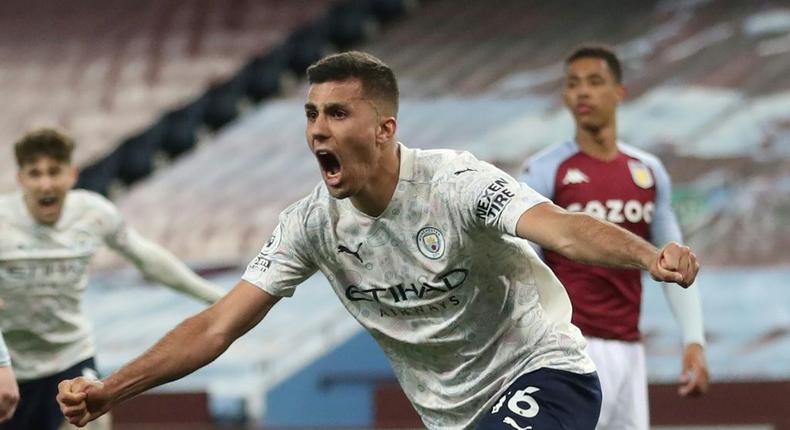 Manchester City midfielder Rodri celebrates scoring at Aston Villa Creator: CARL RECINE