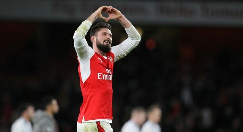 Arsenal's Olivier Giroud celebrates at the final whistle in the match against West Bromwich Albion in London on December 26, 2016