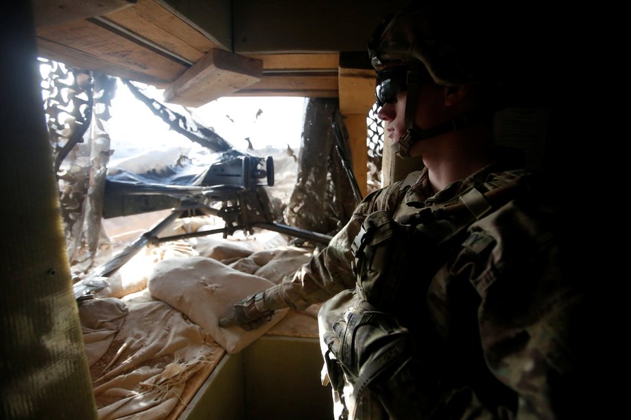 A US Army soldier takes position at the US section of a base for Iraqi army and Kurdish peshmerga forces in Makhmour, southeast of Mosul, Iraq, December 23, 2016.