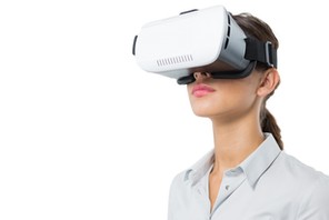 Female executive using virtual reality headset