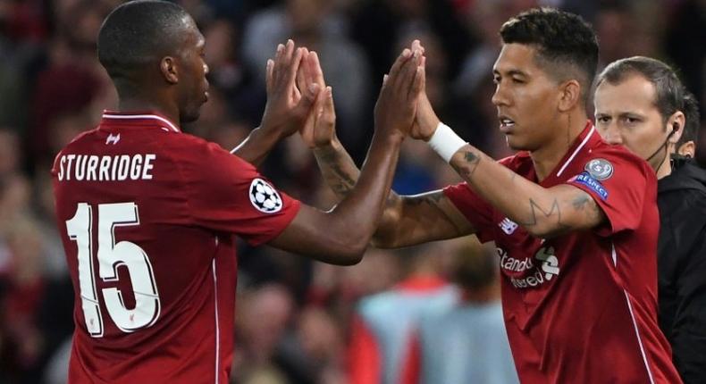 Liverpool forward Roberto Firmino (right) replaces Daniel Sturridge during the Champions League match against Paris Saint-Germain