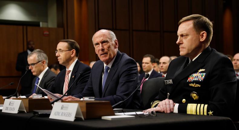 Director of National Intelligence Daniel Coats (2nd-R) testifies as he appears alongside acting FBI Director Andrew McCabe (L), Deputy Attorney General Rod Rosenstein (2nd-L) and National Security Agency Director Michael Rogers (R)