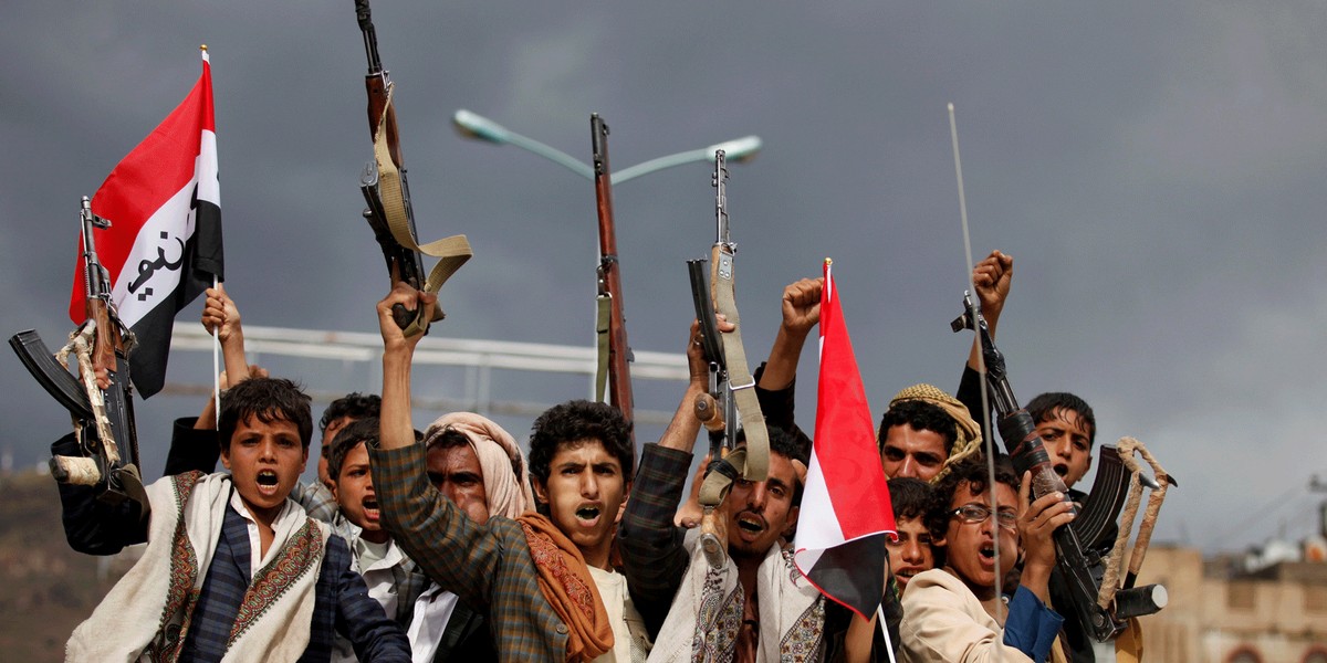 Men riding to a rally held by supporters of Houthi rebels and former Yemeni President Ali Abdullah Saleh to celebrate an agreement reached by Saleh and the Houthis to form a political council to unilaterally rule the country, in Sanaa, Yemen.