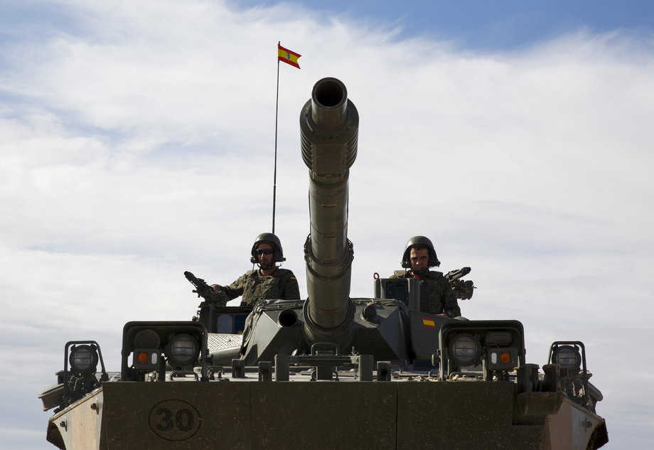 Spanish troops drive a Cougar armored reconnaissance vehicle while taking part in Exercise Trident Juncture 2015, NATO's largest joint and combined military exercise in more than a decade, at the San Gregorio training grounds outside Zaragoza, Spain, November 4, 2015