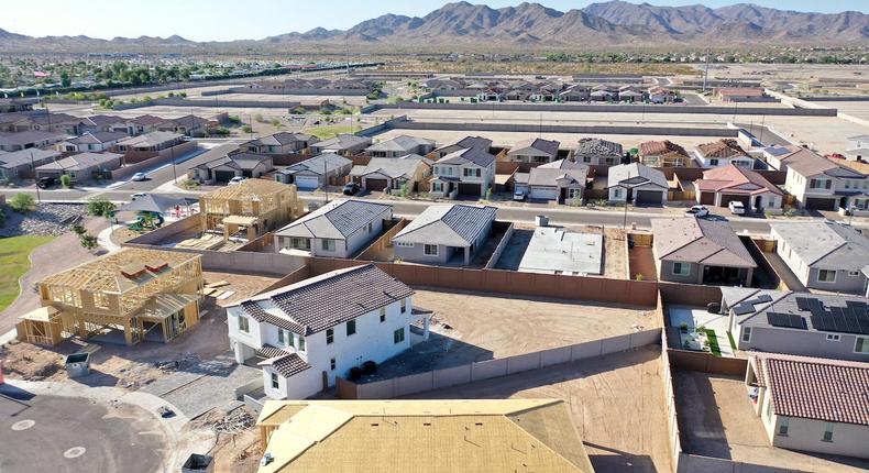 An aerial view of new homes under construction at a housing development on June 7, 2023 in Buckeye, Arizona. Buckeye is one of the fastest growing cities in the country and is located on the fringe of the Phoenix metropolitan area.Mario Tama/Getty Images