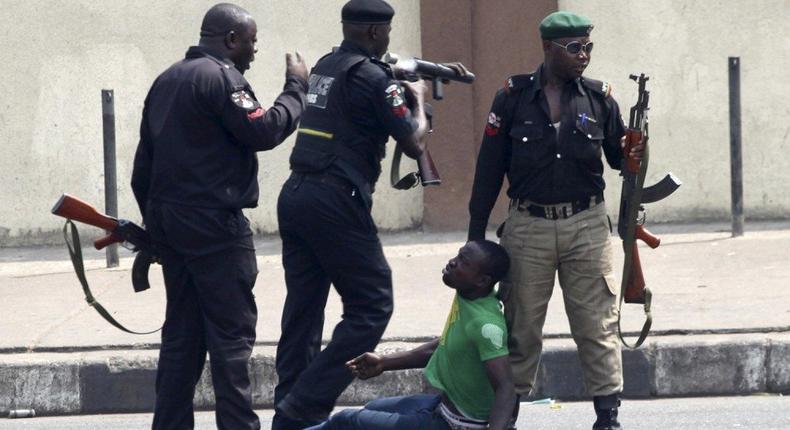An illustrative photo of police officers arresting a suspect. [davinadiaries]