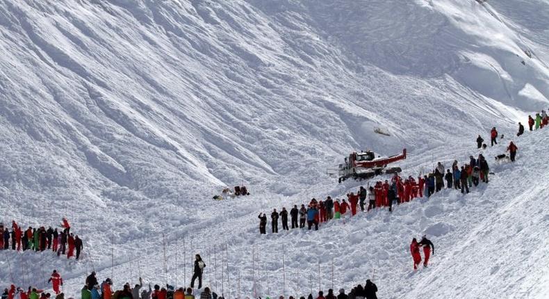 Rescuers work in an off-piste area after an avalanche engulfed nine people, killing at least four, in Tignes, in the French Alps, in a picture made available by Radio Val d'Isere on Febuary 13, 2017