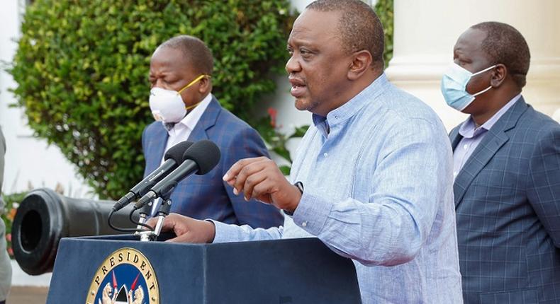 President Uhuru Kenyatta with CSs Dr Fred Matiang'i (Interior) and Mutahi Kagwe (Health) during an address to the nation on May 23, 2020