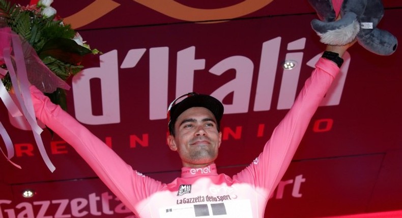 Dutch cyclist Tom Dumoulin celebrates after winning the 10th stage of the 100th Giro d'Italia in Montefalco, on May 16, 2017