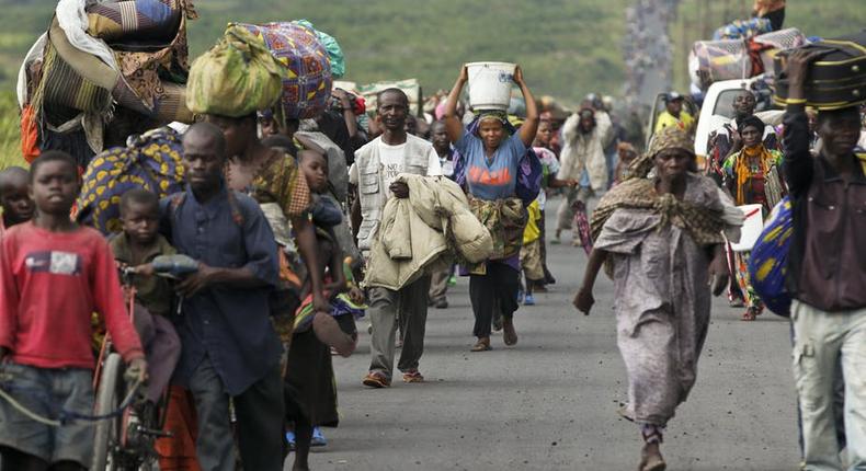 Refugees fleeing the DRC during fighting between rebels and government troops