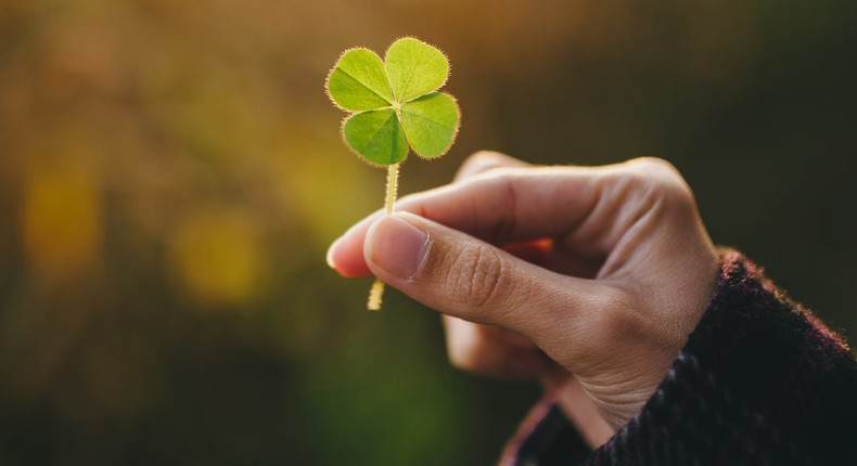 Imagining that carrying around a four-leafed clover will bring you good luck is a prime example of magical thinking.tomaz sedonja / Getty Images