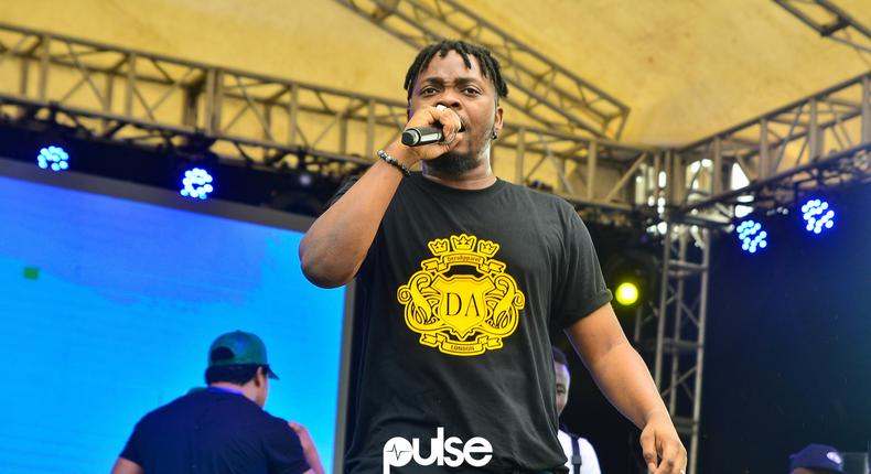 Olamide pictured here performing at Access Bank Lagos City Marathon 2019 celebrates his 30th birthday today March 15, 2019 [Pulse]