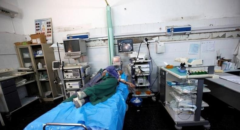 A patient lies on a bed as she receives treatment at Tripoli Central Hospital in Tripoli, Libya July 18, 2016. Picture taken July 18, 2016. 