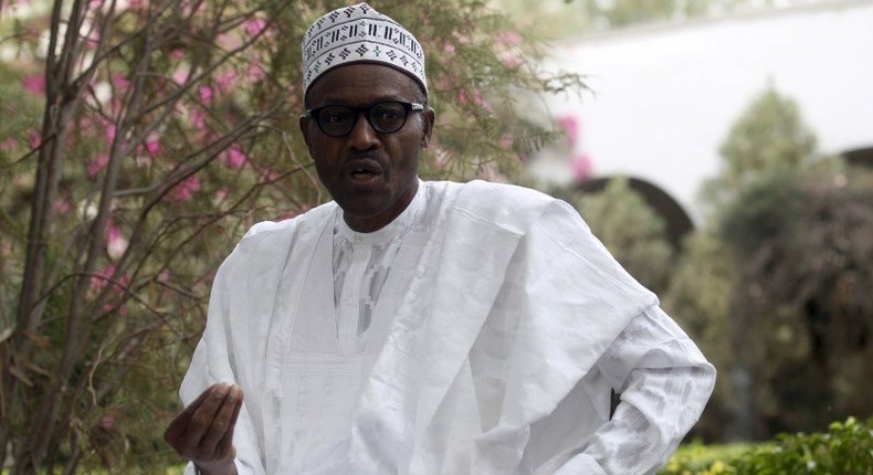 Nigerian president Muhammodu Buhari addresses a news conference outside his house after he voted in Daura, March 28, 2015. REUTERS/Akintunde Akinleye