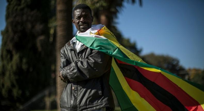 Zimbabwe's national flag became a symbol of anti-government protests after evangelical pastor Evan Mawarire (not pictured) posted a video in April in which he appeared with the flag wound around his neck