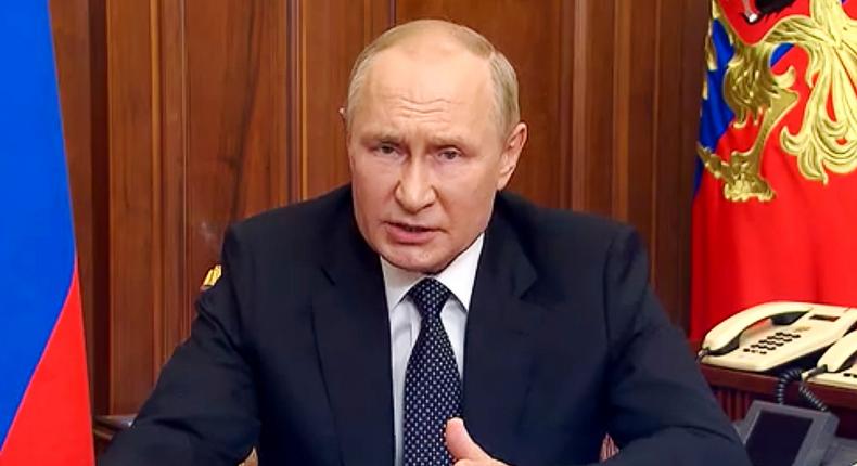 In this image made from video released by the Russian Presidential Press Service, Russian President Vladimir Putin gestures as he addresses the nation in Moscow, Russia, Wednesday, Sept. 21, 2022.