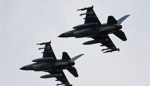 Ukrainian F-16s in the air in an undisclosed location in August.REUTERS/Valentyn Ogirenko