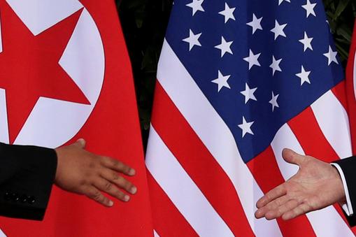 U.S. President Trump and North Korea's Kim meet at the start of their summit in Singapore