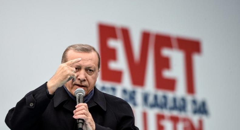 Turkish President Recep Tayyip Erdogan delivers a speech on April 8, 2017 during a campaign rally for the yes vote in a constitutional referendum in Istanbul