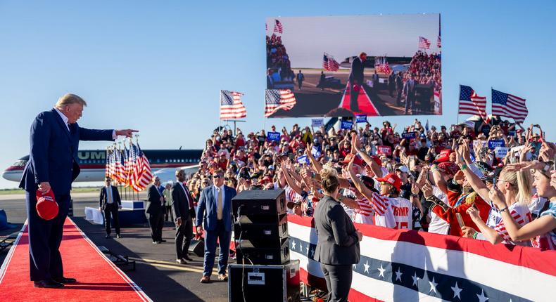 Former US President Donald Trump points to crowd members before taking the stage at a 2024 campaign rally at the Waco Regional Airport on March 25, 2023 in Waco, Texas.Brandon Bell/Getty Images