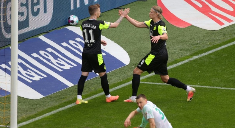 Haaland (R) celebrates with Dortmund captain Reus after scoring in Sunday's 4-1 home win against Werder Bremen