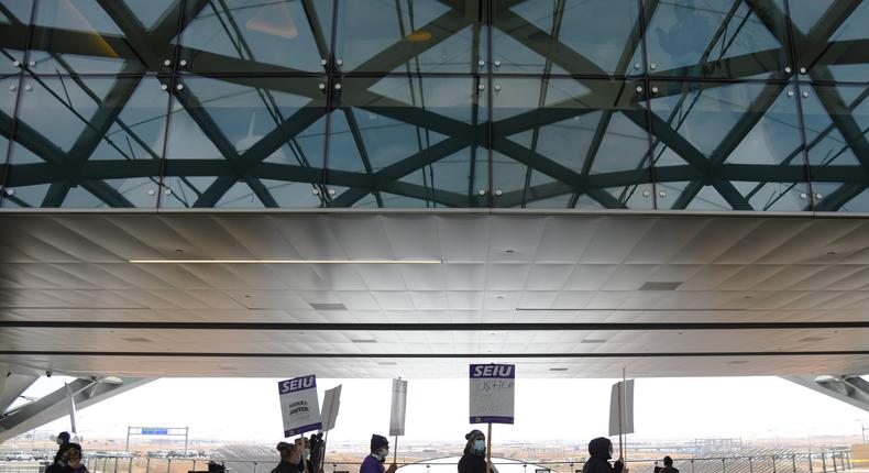 Hundreds of Denver International Airport janitors walked off the job, striking for higher pay and less taxing workload at Denver International Airport in Denver, Colorado on Friday, October 1, 2021.Hyoung Chang/MediaNews Group/The Denver Post via Getty Images