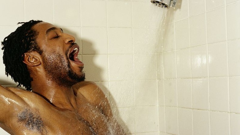 black man showering