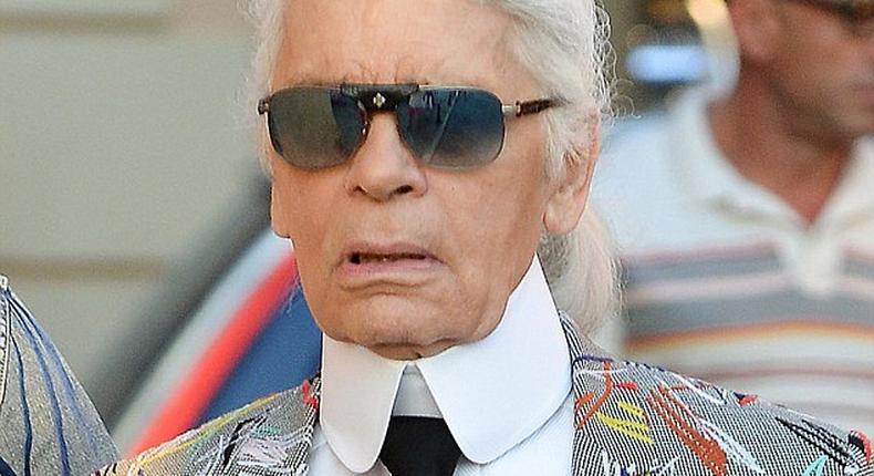 Karl Lagerfeld pictured wearing an unusual vibrant jacket