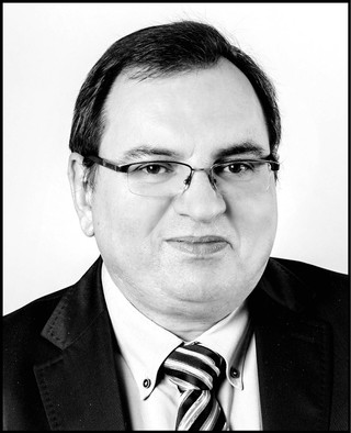 Andrzej Radzisław, radca prawny z Kancelarii Goźlińska, Petryk i Wspólnicy, specjalizujący się w dziedzinie ubezpieczeń społecznych