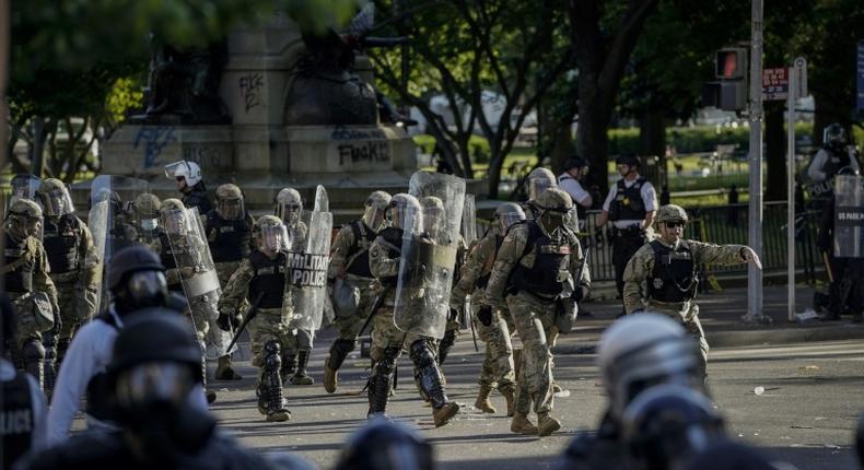 Law enforcement force peaceful protestors out in preparation for President Donald Trump and top advisors to take pictures at a church near the White House on June 1