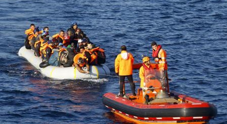 A Turkish Coast Guard fast rigid-hulled inflatable boats tow refugees and migrants in a dinghy on the Turkish territorial waters of the North Eagean Sea, following a failed attempt of crossing to the Greek island of Lesbos, off the shores of Canakkale, Turkey, November 9, 2015.