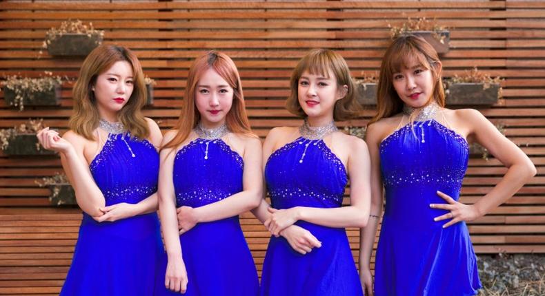 All four members of the K-pop group SixBomb underwent extensive plastic surgery -- from nose jobs to breast implants -- before releasing their first single