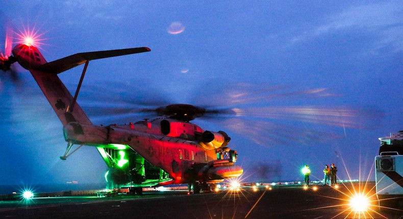 A US Marine Corps CH-53E Super Stallion prepares to take off aboard the amphibious assault ship USS Iwo Jima while transiting the Bab al Mandab Strait, June 7, 2018.