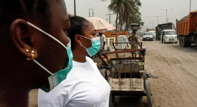 Ladies with nose mask to prevent against Coronavirus in Nigeria/Illustration (Washington Post)