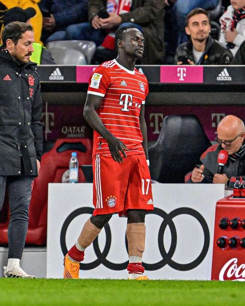 A dejected Mane leaves the pitch.