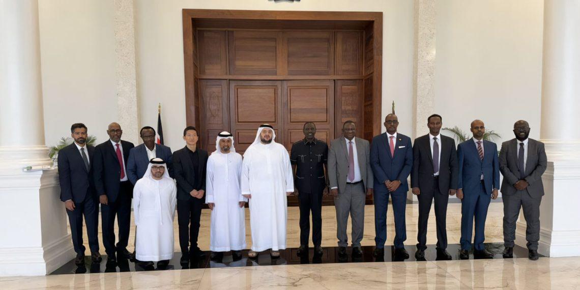 President William Ruto poses for a picture with Kenyan government officials and ADQ officials