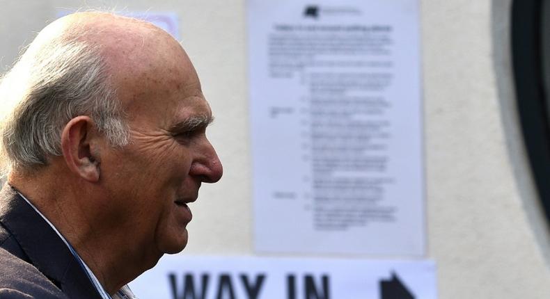Liberal Democrats leader Vince Cable arrives to vote in the European Parliament elections on Sunday which preliminary results later showed his party winning the anti-Brexit vote