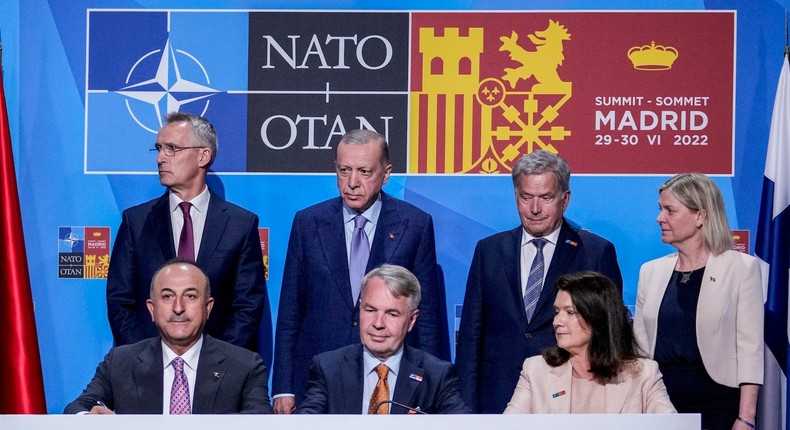 NATO's secretary general along with the leaders and foreign ministers of Turkey, Finland, and Sweden in Madrid, Spain, on June 28, 2022.