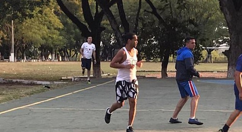 Ronaldinho has been pictured participating in a football tournament in a Paraguay prison