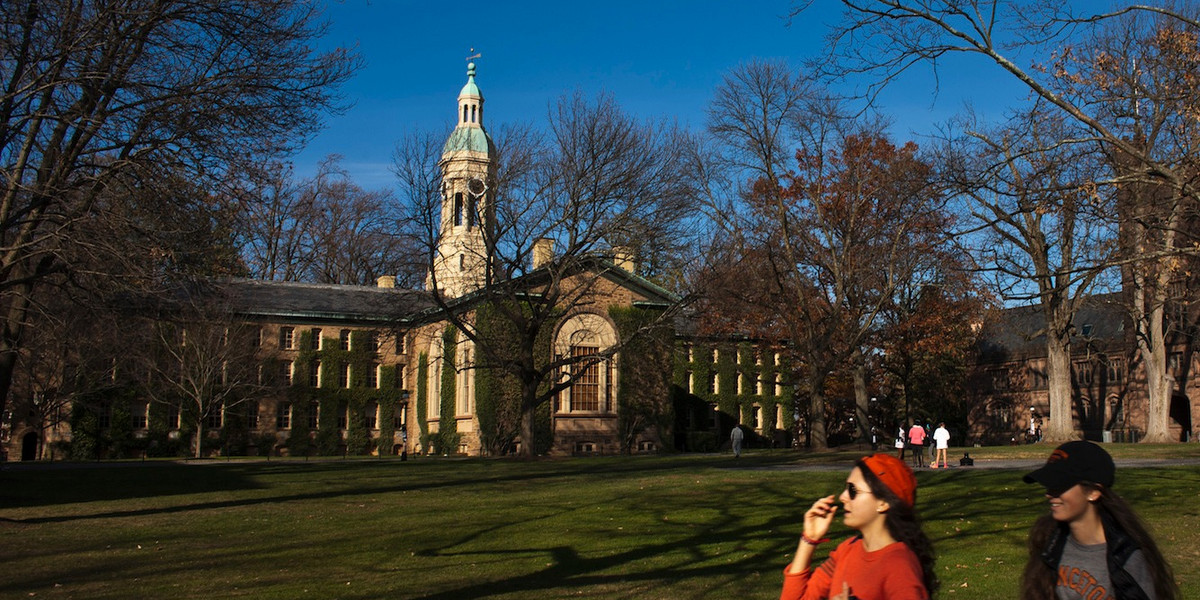 Students walk around the Princeton University campus.